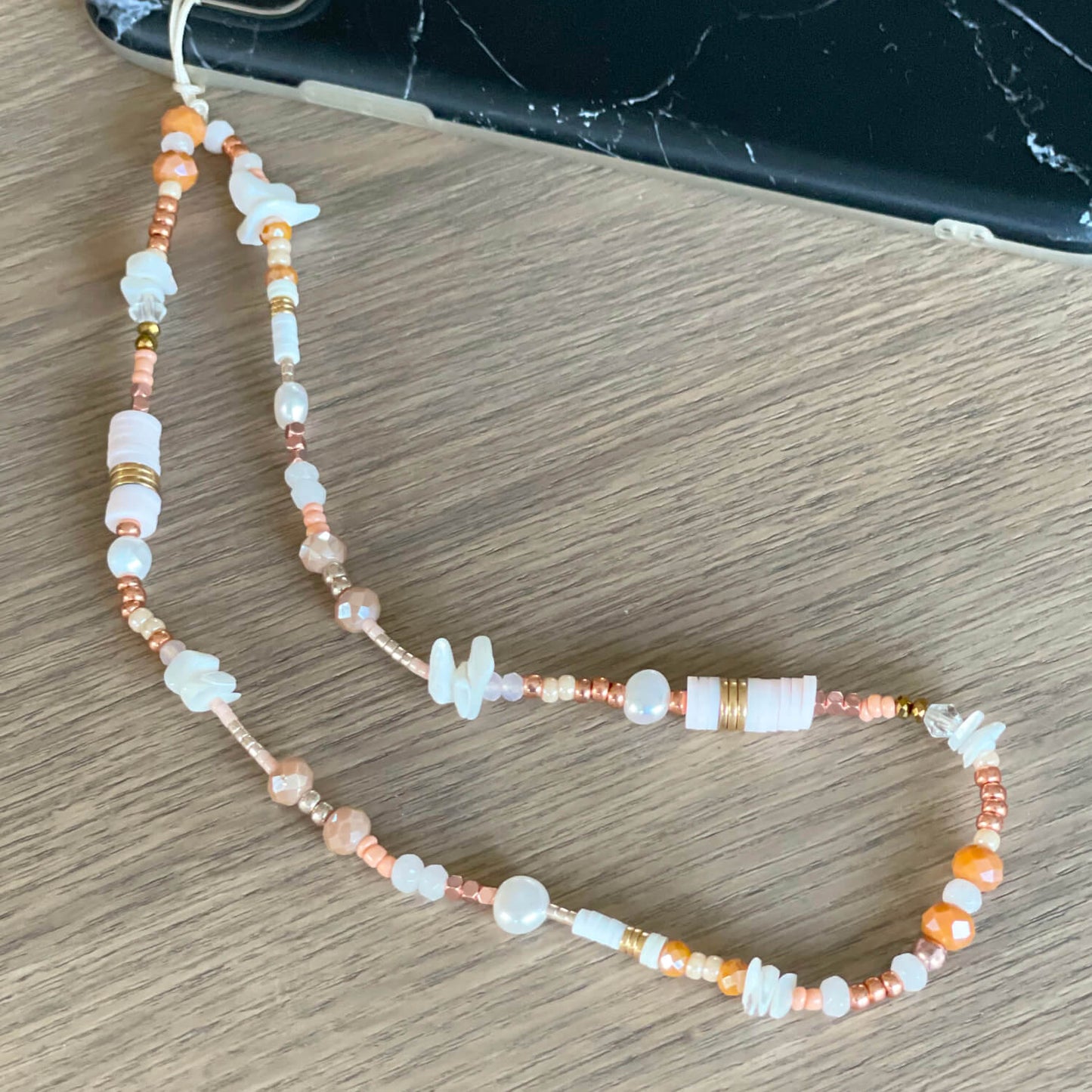 Bijou de téléphone or rose