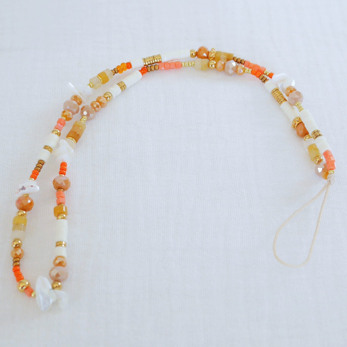 Bijou de téléphone orange