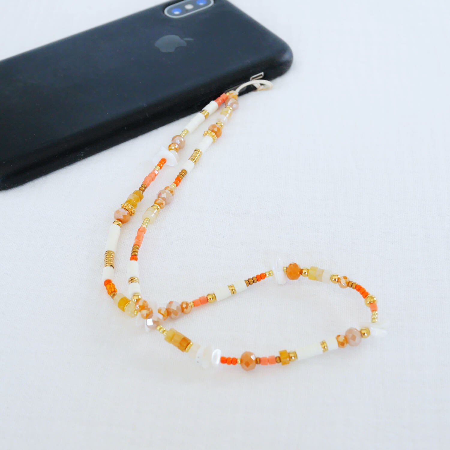 Bijou de téléphone orange